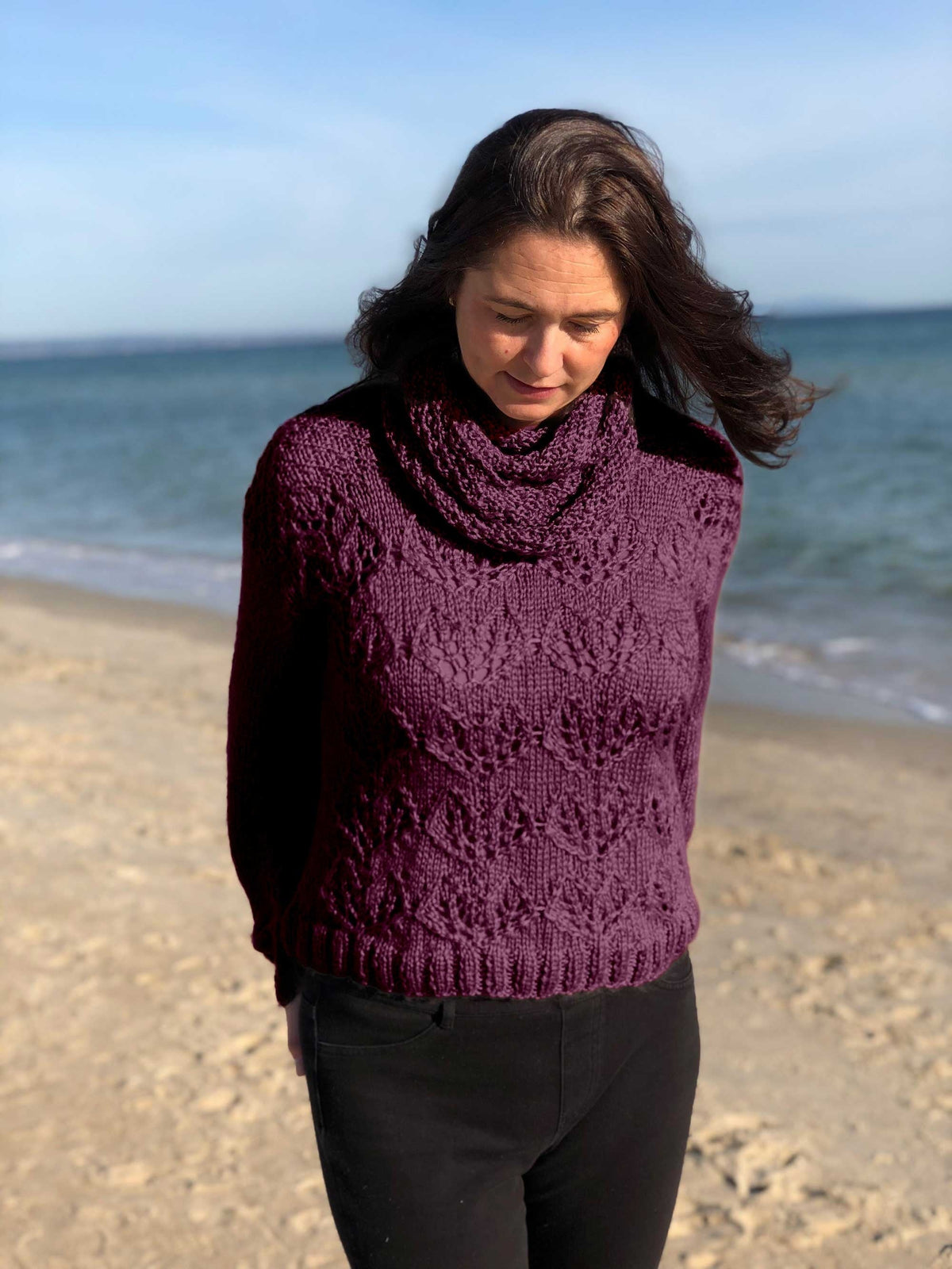 Woman wearing the #149 Ingrid Lace Jumper in Scandi Soft XL with the loose collar – knitting pattern by Anette Eriksson