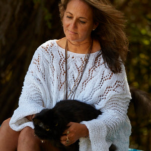 Close view of the Lace Tunic #107 in white, showing the stacked lace panels