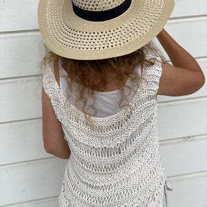Back view of the Boho drop stitch top #112 in ecru, worn with a wide-brimmed straw hat