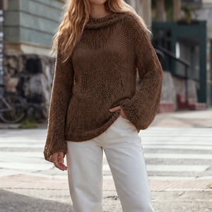 Tora Loose Sweater #141 in hazelnut, a loose chunky cotton jumper worn with cream trousers