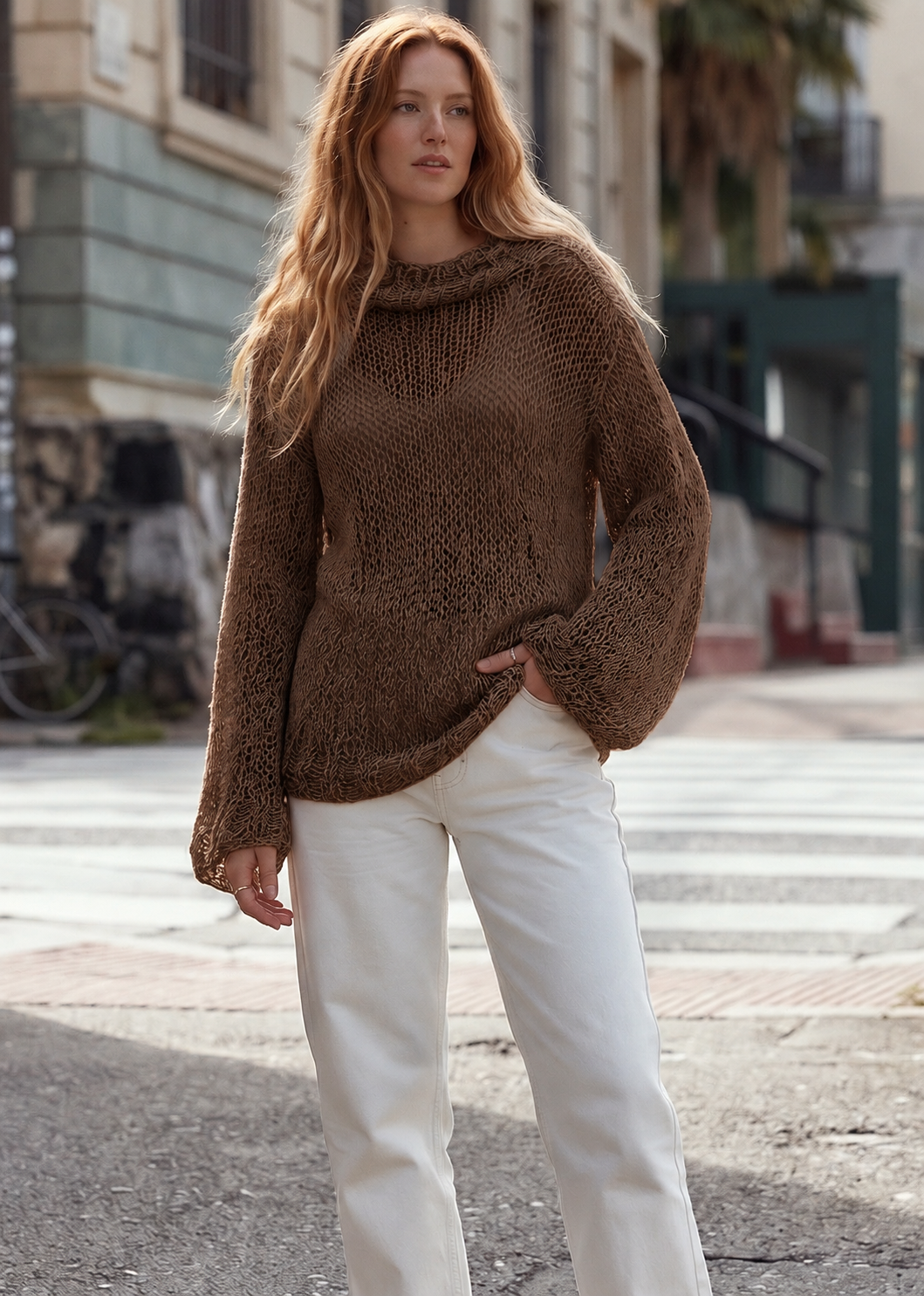 Tora Loose Sweater #141 in hazelnut, a loose chunky cotton jumper worn with cream trousers