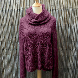 The Ingrid lace jumper #149 in Snö Mulberry on a mannequin, showing the loose collar