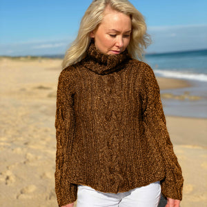The Hedda Cable Roll Neck #150 in Scandi Wool Toffee, showing the cable panel