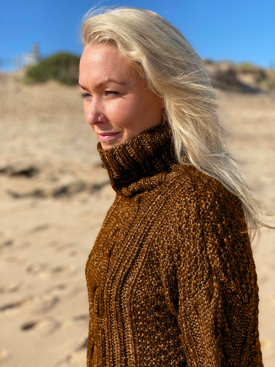 The Hedda Cable Roll Neck #150 knitted in Scandi Wool Toffee, side view