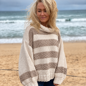 Svala Striped Sweater #182 with linen stripes, a chunky cotton roll neck worn by the sea