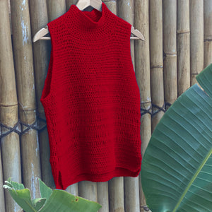 The Crochet Top #190 in red on a hanger, showing the high neck