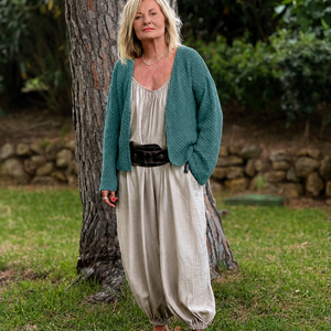Super Easy Cardigan #316 in teal, a chunky double moss stitch cardigan worn open over cream