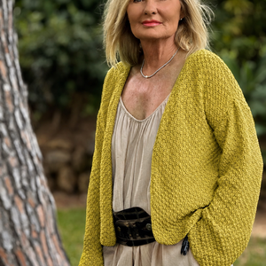 Super Easy Cardigan #316 in chartreuse, worn open beside a tree over a cream outfit