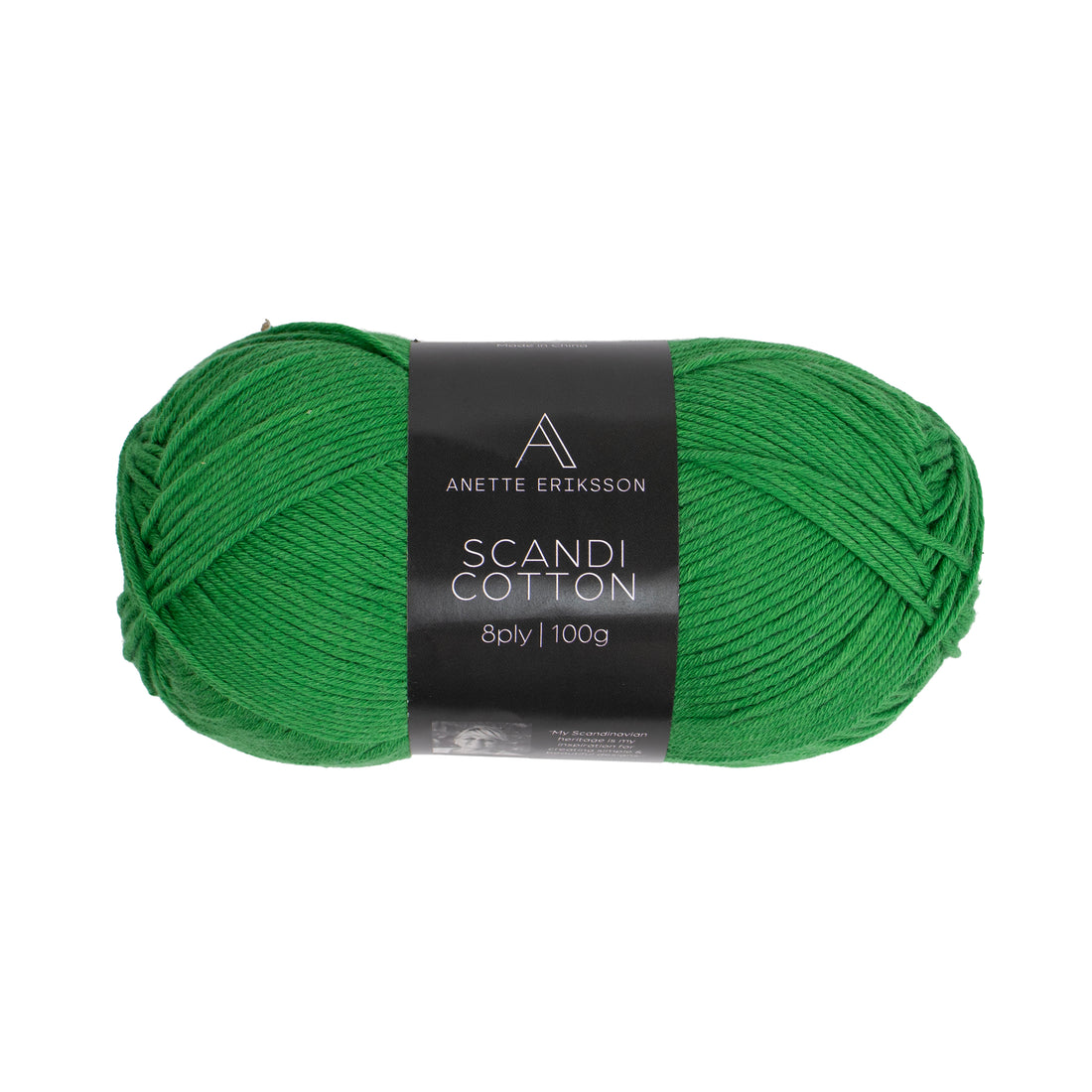 A ball of Anette Eriksson Scandi Cotton in emerald, the yarn the Crochet Jumper #109 is crocheted in