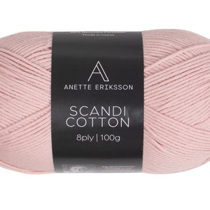 A ball of Anette Eriksson Scandi Cotton in blossom pink, the yarn the Embla t-shirt #132 is knitted in