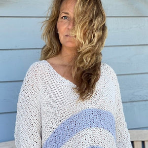 Woman wearing the Serenity two-colour sweater #166, showing the double moss stitch stripes