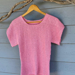 The Summer Top #174 in pink on a hanger, showing the crochet-finished neckline