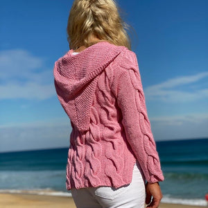 Back view of the Hooded Cable Jumper #172 in pink, showing the knitted hood